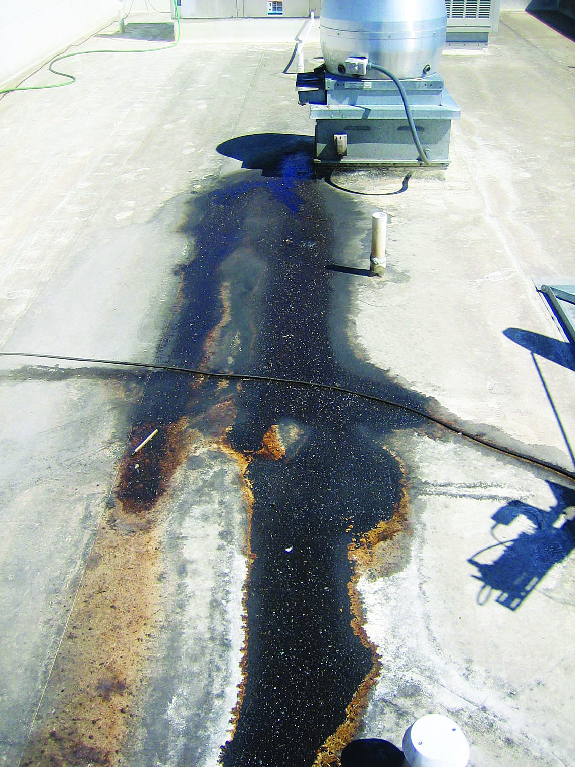 Rooftop grease condition overview around commercial exhaust fans